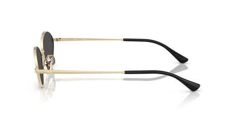 Side view of Kai Oval Sunglasses 56mm Pale Gold Frame With Dark Grey Lenses, showing eco conscious retro style and adjustable nose pads