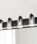 Four Light Black Wall Sconce Vanity Light with Seedy Glass Shades 28 Inch modern bathroom mirror hallway lighting fixture