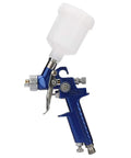 High Performance Pneumatic HVLP Gravity Feed Oil Paint Sprayer Hella Fine Atomization With Badass Overspray Control for precise painting.