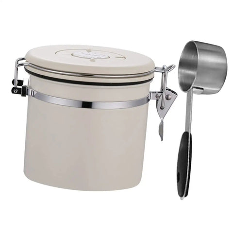 Sleek Stainless Steel Coffee Bean Storage Jars With Reliable Tight Seal Lids To Keep Your Morning Java Fresh As A Sick Kitchen Stack Canister Set Of Three For Tea Cereal And Snacks - beige canister with measuring scoop.