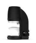 Automatic Espresso Tamper Tool For 58 Mm Commercial Portafilters And Pro Barista Gear Smooth Operator Puck Press in black, side view.