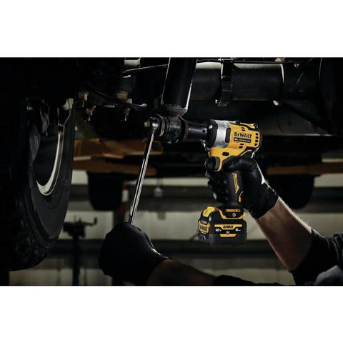Mechanic using Xtreme 12V Max Brushless One Half Inch Cordless Impact Wrench Tool Only under vehicle, showcasing torque and LED ring.