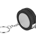 Two Piece Measuring Wheel And Retractable Tape Featuring Cm And Foot Dial And Heavy Duty Click Lock For Slick Fence Lines Tire Gauges And Quick Site Markouts That Handle Hard Labor Like A Champ And Ride Easy In Your Trunk, tire-shaped tape measure on keychain.