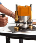 Heavy Duty 3.25 HP Soft Start Router Motor mounted on router table with adjustable depth for woodworking projects.