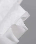 Commercial Tea And Paper Coffee Filters 1.5 Gallon White 500 Count close-up showing filter material and texture