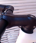Carbon Fiber Bike Stem 31.8mm Clamp 60mm Length 17 Degree Rise Lightweight MTB Road Stem With 3K Matte Finish And Aluminum Cap attached to handlebars