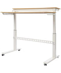 Heavy Duty Dual Tier Standing Desk With Smooth Crank Lift Tough Locking Wheels And Roomy Carbon Steel Desktop For Home Office view with white frame and wooden top.