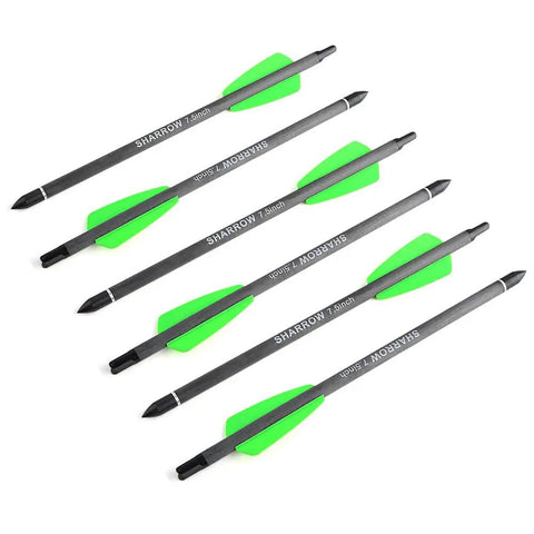 Five 7.5 Inch Carbon Crossbow Bolts with 2 Inch Green Vanes and 100 Grain Removable Tips on white background