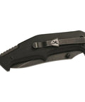 Folded Outdoorsman Survival Combo Knife With Assisted Opening, 4.5 Inch Closed, Black G10 Handle, Pocket Clip visible