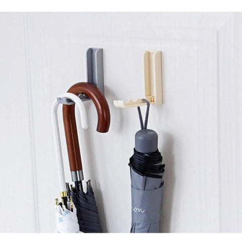 Slick Foldable Wall Hooks With Adhesive Backing For Space Saving No Drill Setup To Hang umbrellas in foyer closet.