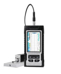 Heavy Duty Digital Surface Roughness Tester Delivering Straight Up Precision Measurements And Super Easy Carry Options For Daily Shop Floor Inspections Includes A Compact Handheld Roughness Meter With Rock Solid Construction And Flawless Readings on a workbench with measurement display.