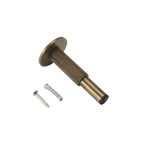 Heavy Duty Brass Door Stopper With Knurled Texture For Floor Wall Mount, Solid Metal Bumper with screws for secure attachment.