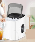 Solid Countertop Automatic Ice Maker For Kitchens Or Game Rooms Producing Fast Crystal Clear Cubes In Minutes With Low Key Push Button Controls.