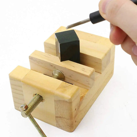 Claky Wood Working Flat Pliers And Vise Clamp For Table Bench Seal holding a wood piece steady while engraving with a tool.