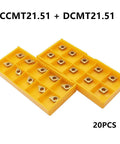 Carbide turning inserts (CCMT/DCMT) in two yellow trays, 20 pieces.