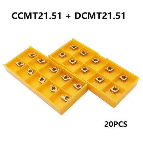 Carbide turning inserts (CCMT/DCMT) in two yellow trays, 20 pieces.
