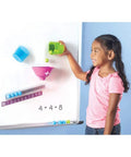 Child using Totally Kid Approved Magnetic Addition Machine And Math Game Making Counting A Real Breeze For Preschoolers Ages 4 Plus.