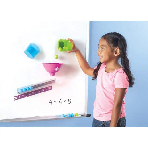 Child using Totally Kid Approved Magnetic Addition Machine And Math Game Making Counting A Real Breeze For Preschoolers Ages 4 Plus.