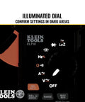 Auto Ranging Digital Clamp Meter With True RMS for AC and DC current and voltage resistance, illuminated dial close-up.