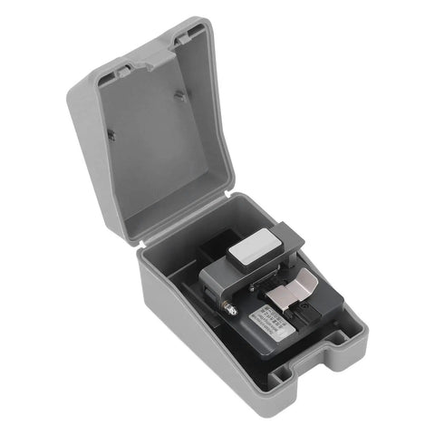 Pro Optical Fiber Cleaver Machine with Tungsten Steel Blade For Precision 90 Degree Cuts in protective case, compact design for telecom jobs.
