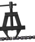 Hella Durable Motorcycle Chain Tensioner Tool Adjustable Chain Tightener For S Chain Rock Solid Bike Chain Adjuster shown on chain.