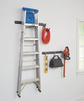 FastTrack Garage Storage Rail System 7 Piece Hook Kit with tools and ladder hanging in garage