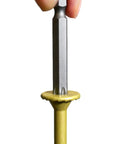 A hand holding a T40 star drive bit for the 50 Pack 5/16 Inch X 4 Inch T40 Star Drive Structural Screws For Decking Framing Heavy Duty Beef No Sweat Self Drilling Installation With Grip Tight Hold And Rustproof Gold Coating.