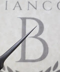 Needle Nose Precision Tweezers For Fine Hair Removal Bottle Nose Stainless Steel Tweezers With Hand Filed Sharp Tips Perfect For Ingrown Hairs And Detail Work Grabs Tiny Hairs Like A Boss With Ease. stainless steel tip close-up on Bianca logo