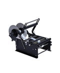 Wultek Precision Bottle Labeling Machine With Handle, manual label press, adjustable clamps, for various bottle shapes.