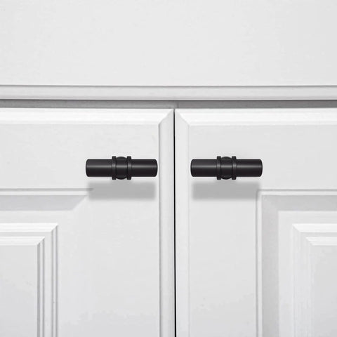 2 Pack Matte Black Cabinet Pulls T Bar Knobs For Kitchen Cupboards And Bathroom Cabinets installed on white doors