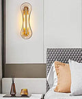 Premium Handcrafted Glass Wall Sconces For Bedroom And Living Room Solid Stainless Steel Bedside Lighting Fixture With Glare Free Soft Glow That Hits Different Crisp Build Delivers Sick Vibes Today mounted above a bed.