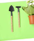 Durable Dope Wooden Garden Tool Handle Replacement For Shovel and Hoe with plant in background