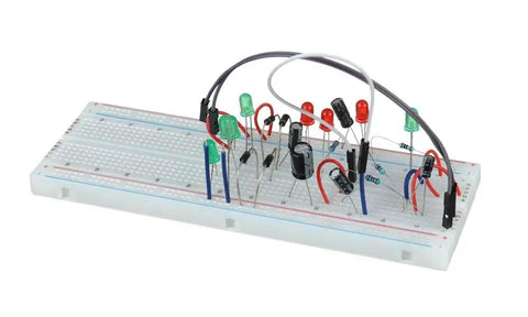 Breadboard with All In One Aluminum Electrolytic Capacitor Kit With 630 Pieces And 24 Values From 0.1uF To 1000uF in use
