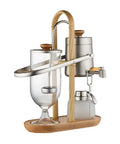 Top Shelf Belgian Siphon Coffee Maker With Clear Glass Chamber And Sleek Silver Base For No Fuss Morning Brews Delivering Legit Rich Flavor That Truly Is A Game Changer, showing sleek design and materials.