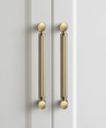 6 Pack 5 Inch Center To Center Knurled Cabinet Pulls In Champagne Bronze With Circular End Caps For Modern Furniture on white cabinets