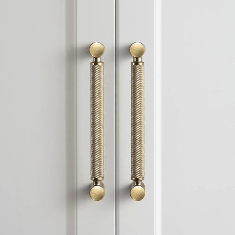 6 Pack 5 Inch Center To Center Knurled Cabinet Pulls In Champagne Bronze With Circular End Caps For Modern Furniture on white cabinets