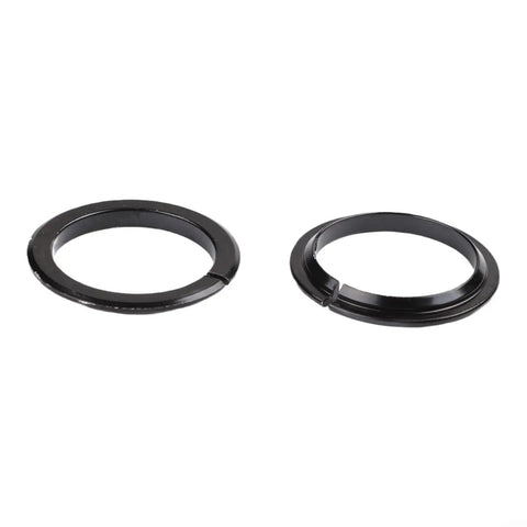 View of the Six Piece Steering Bearing Kit For G2 Master Electric Scooter Durable Headset Replacement Set With Easy Install Design Helps Improve Steering Precision Across Varied Terrain Kukirin Compatible, showing two black circular headset parts.
