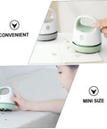 Fuss Free Rechargeable Desktop Vacuum Cleaner That Knocks Dust And Pet Hair To The Curb In Seconds, compact mini size in use.