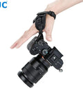 Pro Mirrorless Camera Hand Grip Strap With Arca Type Plate, Adjustable Length, attached to a Sony camera.