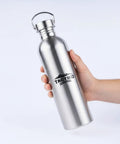 Hand holding Durable Stainless Steel Water Bottle 1500 Ml BPA Free For Camping And Outdoors Campfire Ready 18/8 304