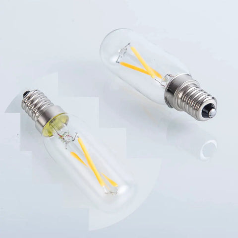 Two B11 Candelabra Base Warm White 2700K Light Bulbs with clear filament on white background.