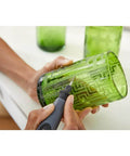 Dremel 729-01 11-piece carving/engraving micro kit; handheld rotary tool engraving a green glass tumbler