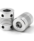 Top Shelf Beam Flex Shaft Coupler 5MM To 8MM Motor Adapter Beefy Aluminum Build, two pieces close-up on white background.