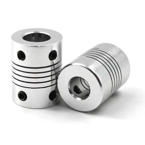 Top Shelf Beam Flex Shaft Coupler 5MM To 8MM Motor Adapter Beefy Aluminum Build, two pieces close-up on white background.