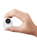 Person holding Compact Mini Turret Dome Camera 1080p Security 4 In 1 Hybrid AHD TVI CVI Analog Weatherproof MicroDome 2MP
