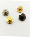 Four metal bag feet rivets for handbags in silver, gold, brass, and black.