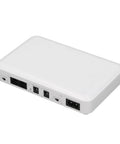 Mini Ups Battery Backup For WiFi Router And Modem 8000 Mah Uninterruptible Power Supply in white, showing back panel connections.