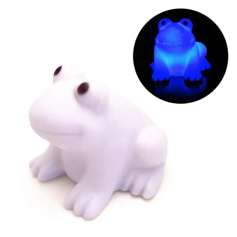 Ultra Cute Frog LED Night Light For Kids Room With Automatic Color Changing LEDs showing white and glowing blue options