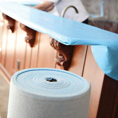 24 Inch By 100 Foot Surface Protector for hardwood, vinyl, tile, marble, stairs, shown covering a countertop, waterproof.