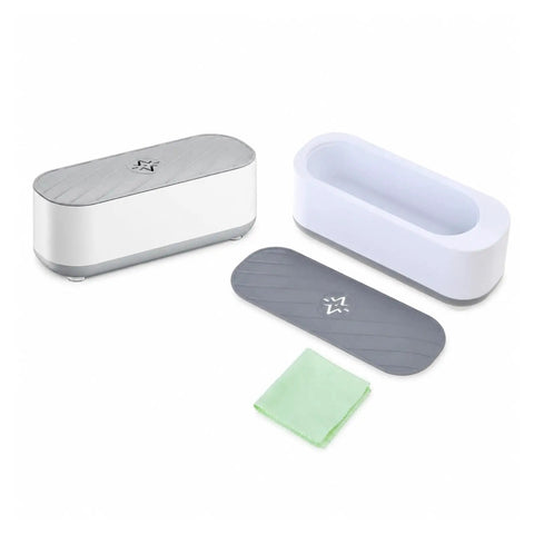 Portable Ultrasonic Jewelry Cleaner For Rings Silver Watches Retainers And Glasses Compact Countertop Machine components including the cleaner and cloth.